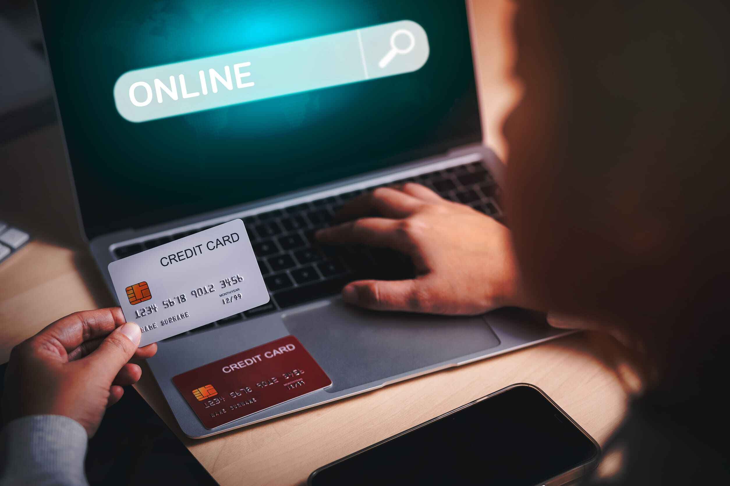Credit Card And Using Laptop Woman Hold Visa Card