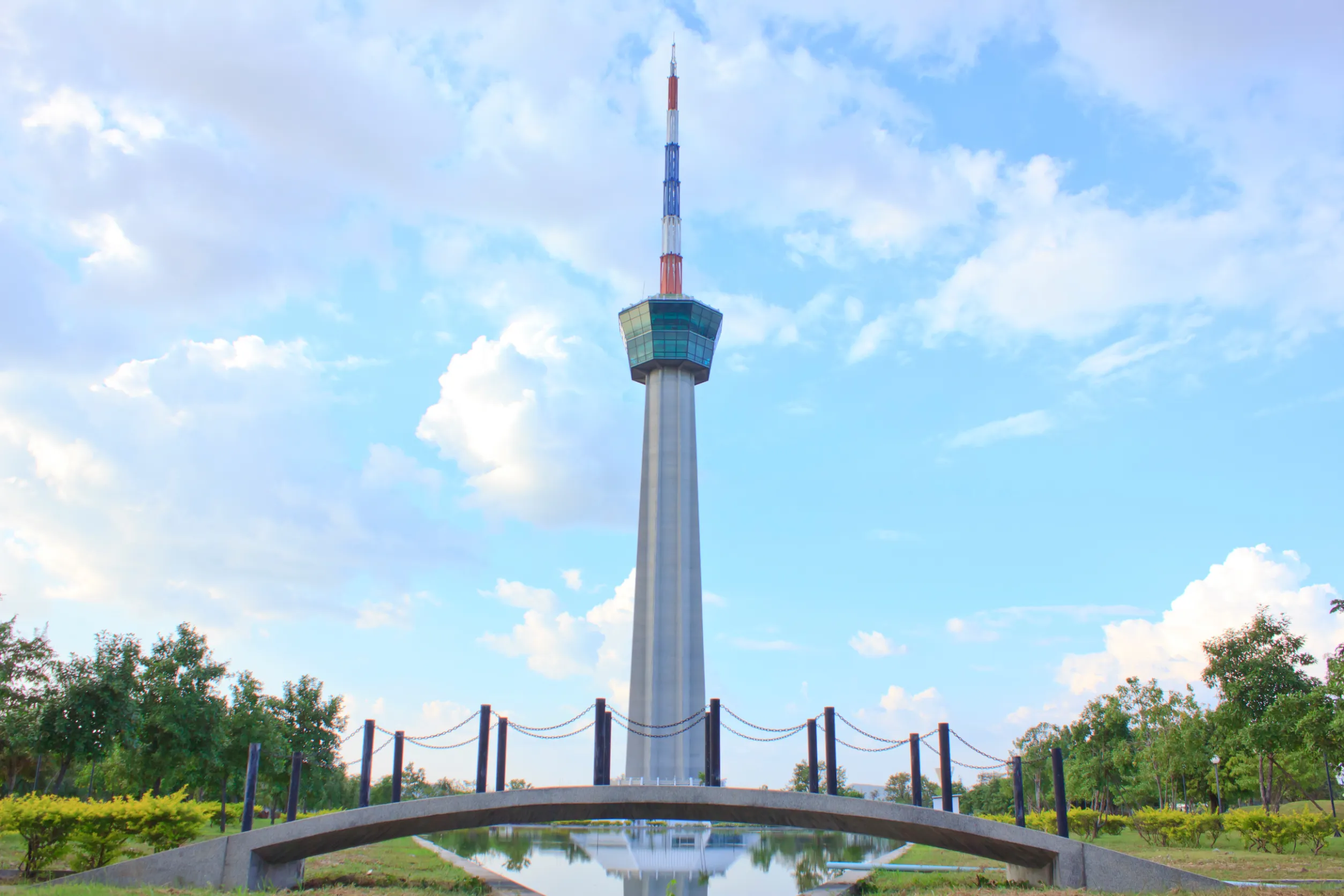 tower against a blue cloudy sk